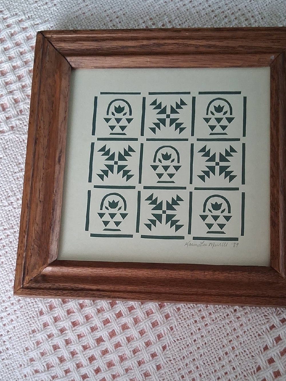 Framed Folk Art Grid Print in Dark Green and Cream